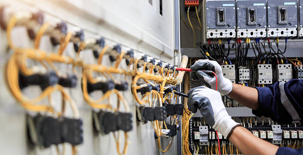 Professional Electrician technician working in Malden, MA